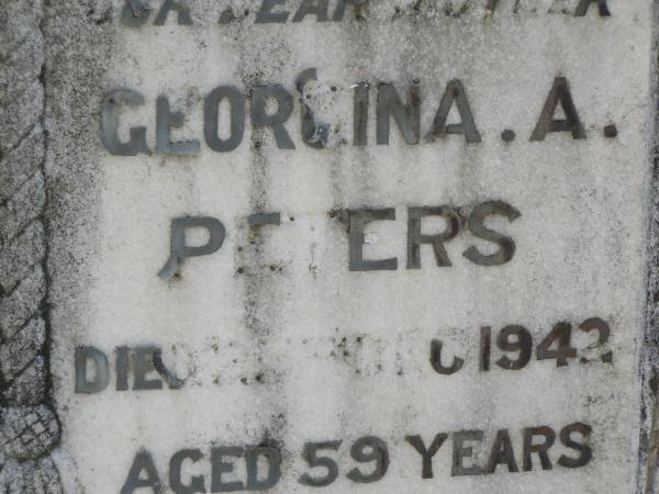 William T. PETERS,  | father,  | died 17? March 1942 aged 63? years;  | Georgina A. PETERS,  | mother,  | died 25? Dec 1942 aged 59 years;  | Moore-Linville general cemetery, Esk Shire  | 