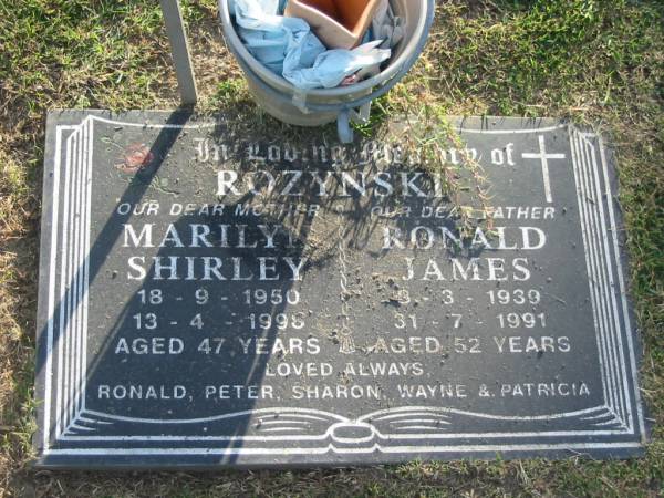 Marilyn Shirley ROZYNSKI,  | 18-9-1950 - 13-4-1998 aged 47 years,  | mother;  | Ronald James ROZYNSKI,  | 3-3-1939 - 31-7-1991 aged 52 years;  | loved by Ronald, Peter, Sharon, Wayne & Patricia;  | Mudgeeraba cemetery, City of Gold Coast  | 