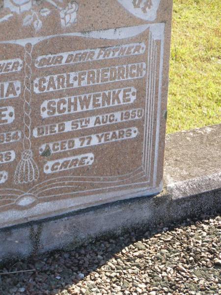 Hulda Maria SCHWENKE,  | mother,  | died 25 July 1954,  | aged 69 years;  | Carl Friedrich SCHWENKE,  | father,  | died 5 Aug 1950 aged 77 years;  | Pimpama Island cemetery, Gold Coast  | 