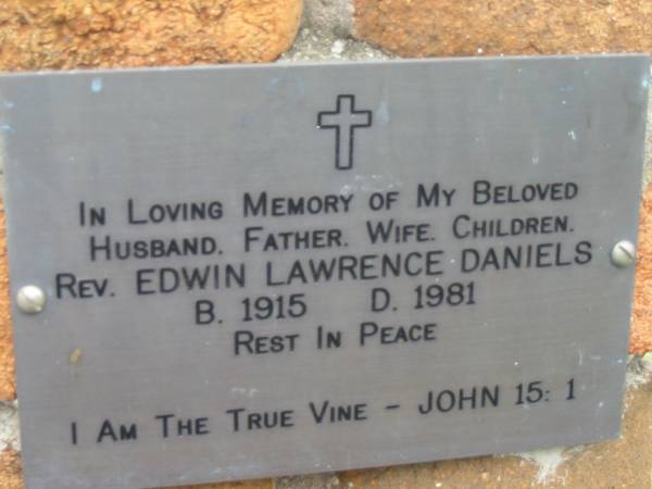 Rev. Edwin Lawrence DANIELS,  | husband father wife children,  | born 1915 died 1981;  | Slacks Creek St Mark's Anglican cemetery, Daisy Hill, Logan City  | 